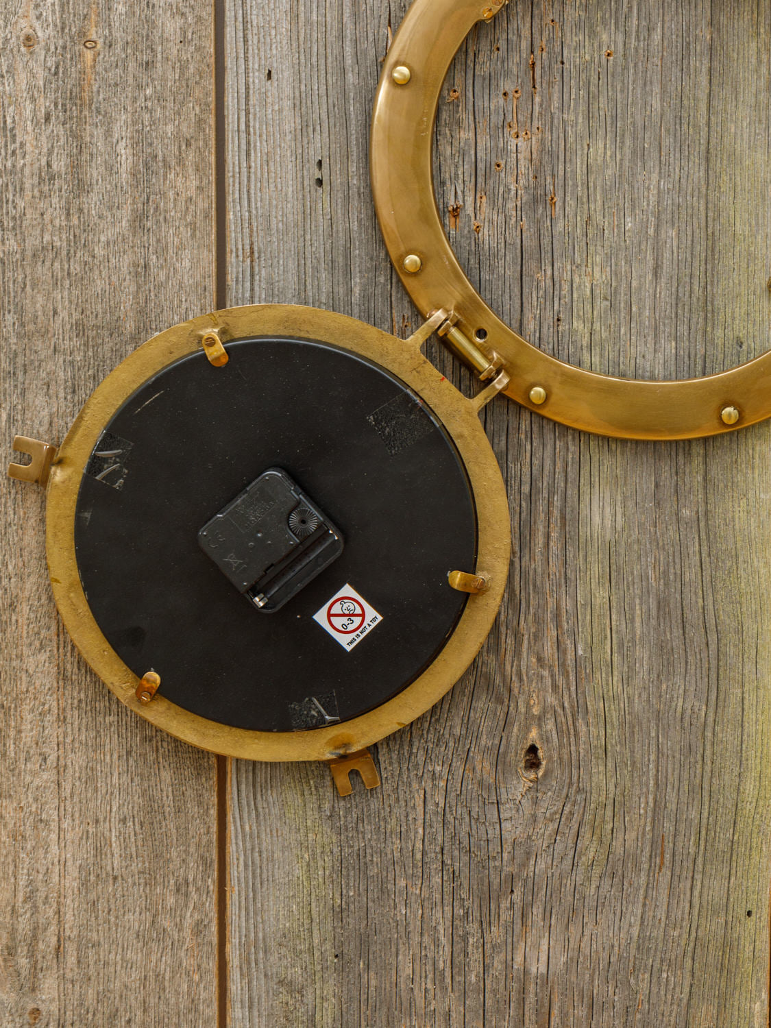 Wanduhr Bullauge Messing